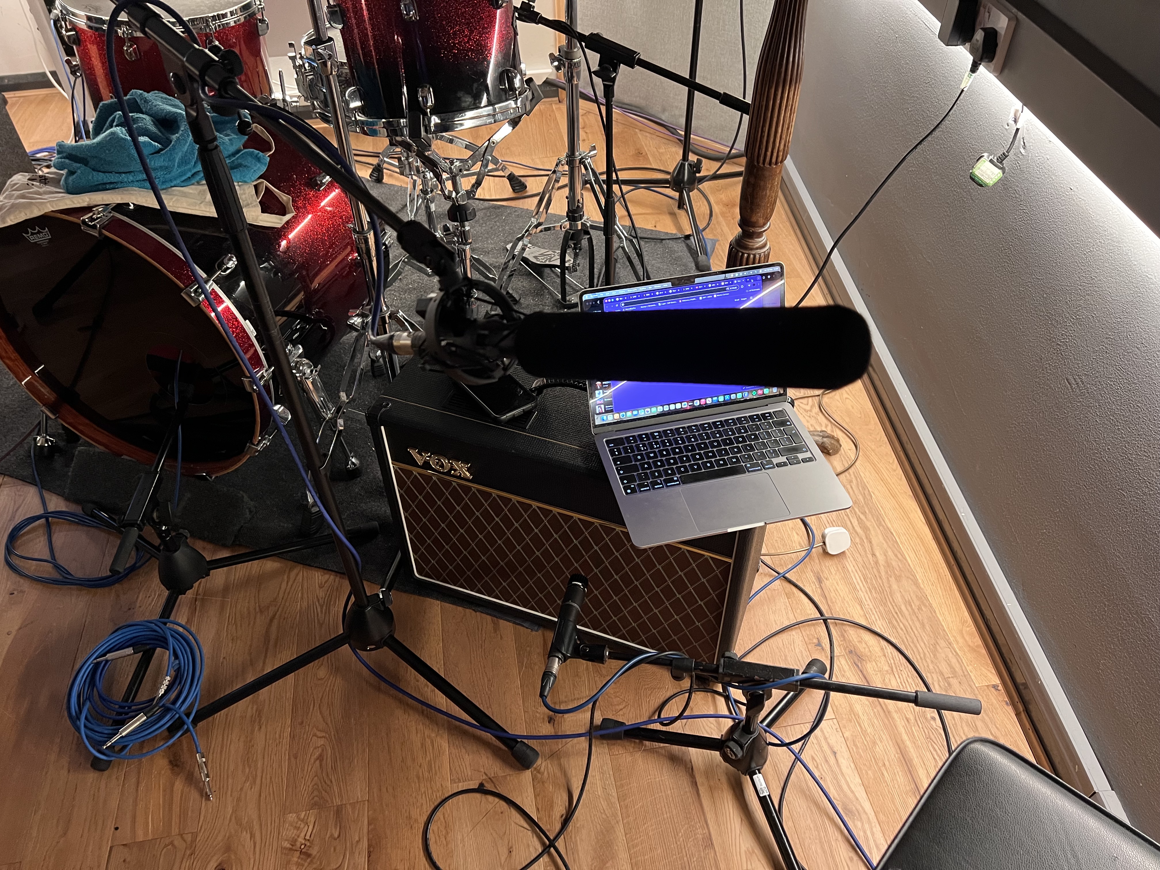 Niroverse work image showing a laptop and audio equipment during a session